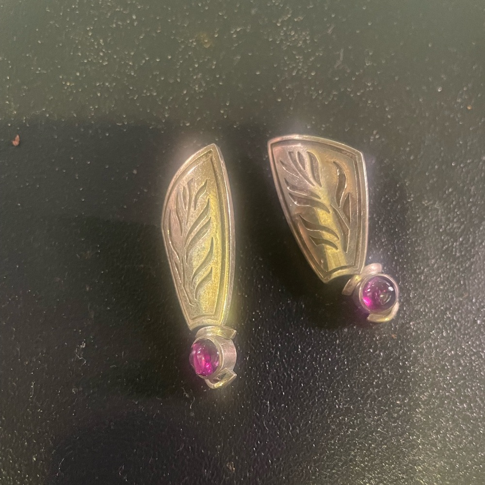 Beautiful sterling earrings with drop dangling garnet.